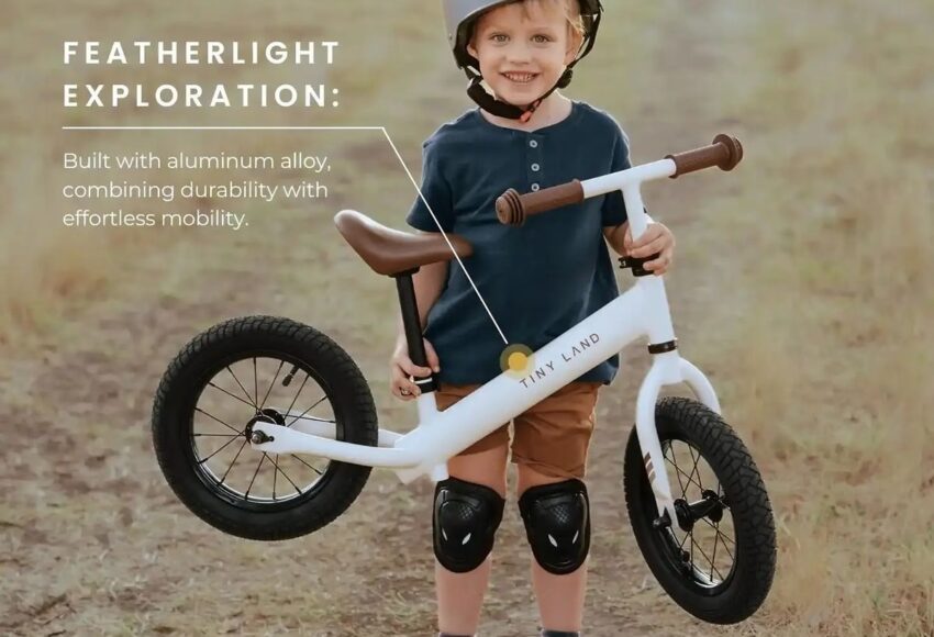 Child riding a bicycle with helmet on a safe outdoor path, representing kids’ cycle selection tips for 2026